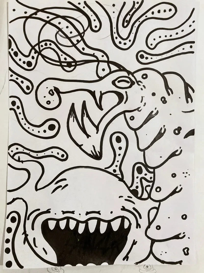 Black ink toothy monster swirls