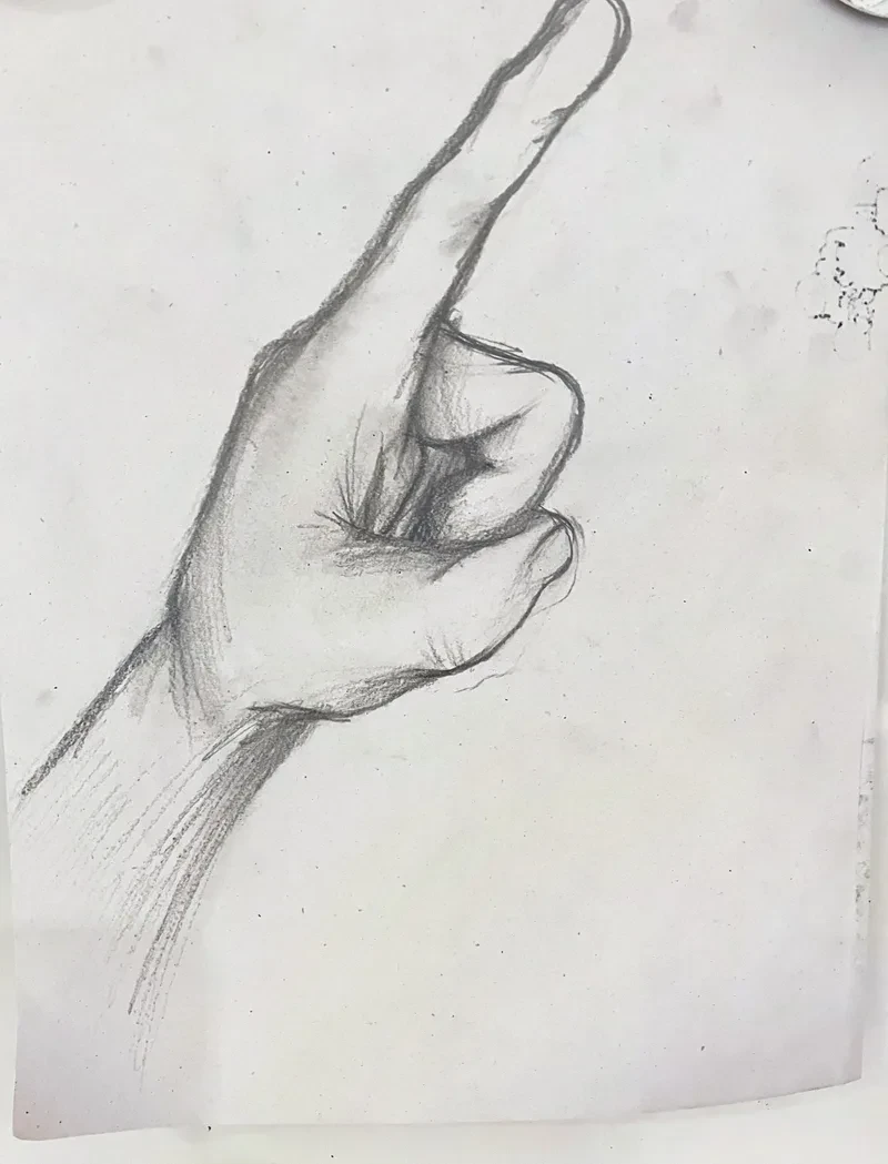 Pencil pointing hand study